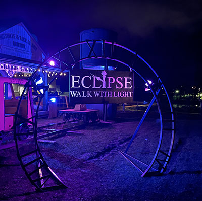 Sign at entrance of Eclipse Walk With Light Huntsville attraction