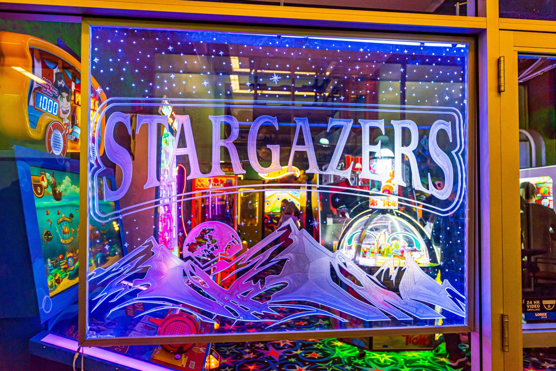 A window sign for Stargazers Arcade